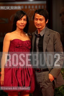 67th Venice International Film Festival - Venice September 2, 2010 - Red Carpet of the film Noruwei No Mori (Norvegian Wood) - The director Tran Anh Hung with his wife