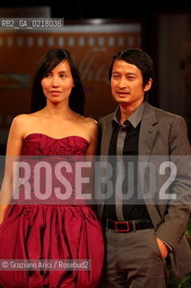 67th Venice International Film Festival - Venice September 2, 2010 - Red Carpet of the film Noruwei No Mori (Norvegian Wood) - The director Tran Anh Hung with his wife