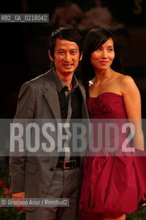 67th Venice International Film Festival - Venice September 2, 2010 - Red Carpet of the film Noruwei No Mori (Norvegian Wood) - The director Tran Anh Hung with his wife