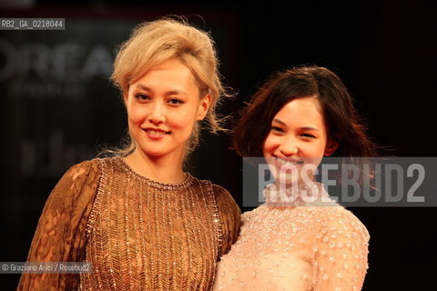 67th Venice International Film Festival - Venice September 2, 2010 - Red Carpet of the film Noruwei No Mori (Norvegian Wood) - The actresses Rinko Kikuchi (left) and Kiko Mizuhara