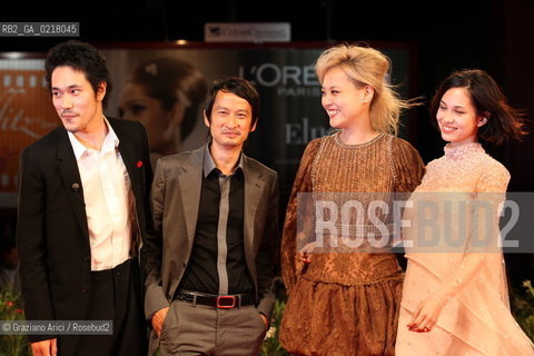 67th Venice International Film Festival - Venice September 2, 2010 - Red Carpet of the film Noruwei No Mori (Norvegian Wood) - Left to right: .The actor Kenichi Matsuyama, director Tran Anh Hung and the actresses Rinko Kikuchi and Kiko Mizuhara