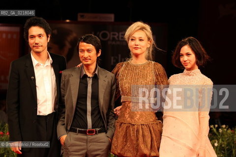 67th Venice International Film Festival - Venice September 2, 2010 - Red Carpet of the film Noruwei No Mori (Norvegian Wood) - Left to right: .The actor Kenichi Matsuyama, director Tran Anh Hung and the actresses Rinko Kikuchi and Kiko Mizuhara