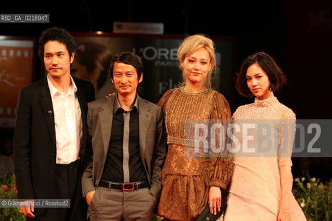 67th Venice International Film Festival - Venice September 2, 2010 - Red Carpet of the film Noruwei No Mori (Norvegian Wood) - Left to right: .The actor Kenichi Matsuyama, director Tran Anh Hung and the actresses Rinko Kikuchi and Kiko Mizuhara