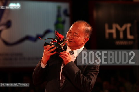 67th Venice International Film Festival - Venice September 3, 2010 - Red Carpet of the film Jianyu (Reign of Assassins) And The Golden Lion For Lifetime Achievement to John Woo. The director John Woo with the Lion