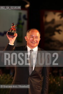 67th Venice International Film Festival - Venice September 3, 2010 - Red Carpet of the film Jianyu (Reign of Assassins) And The Golden Lion For Lifetime Achievement to John Woo. The director John Woo with the Lion