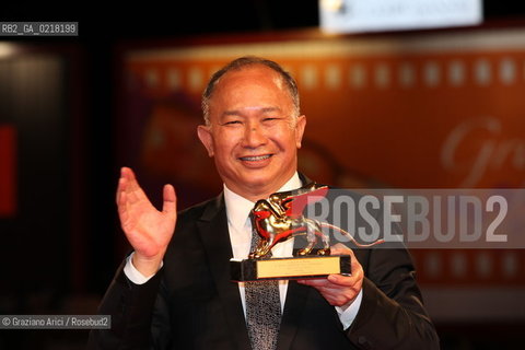 67th Venice International Film Festival - Venice September 3, 2010 - Red Carpet of the film Jianyu (Reign of Assassins) And The Golden Lion For Lifetime Achievement to John Woo. The director John Woo with the Lion