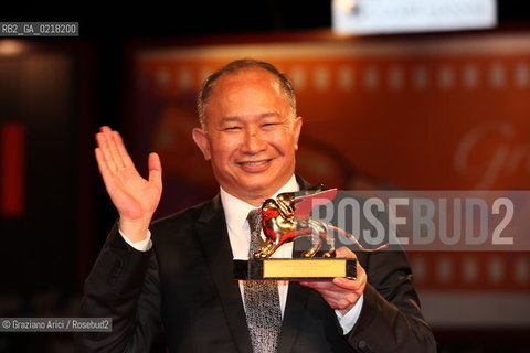 67th Venice International Film Festival - Venice September 3, 2010 - Red Carpet of the film Jianyu (Reign of Assassins) And The Golden Lion For Lifetime Achievement to John Woo. The director John Woo with the Lion
