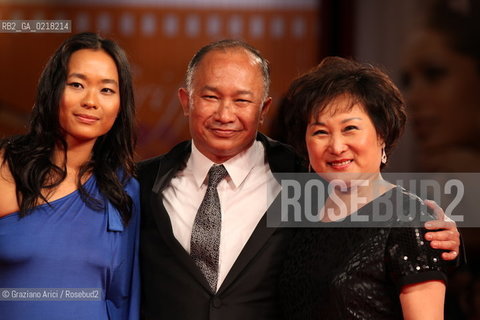 67th Venice International Film Festival - Venice September 3, 2010 - Red Carpet of the film Jianyu (Reign of Assassins) And The Golden Lion For Lifetime Achievement to John Woo. The director John Woo with actress Angeles Woo and his wife Annie Woo