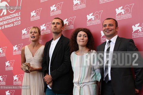 67th Venice International Film Festival - Venice September 4, 2010 - Photocall of the film A Bassa Marea - The director Roberto De Paolis (second left) with the actors