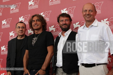 67th Venice International Film Festival - Venice September 5, 2010 - Photocall of the film Niente Paura, Come Siamo Come Eravamo e le Canzoni di Luciano Ligabue - The director Piergiorgio Gay, Luciano Ligabue singer and Piergiorgio Paterlini screenwriter.