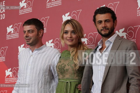 67th Venice International Film Festival - Venice September 5, 2010 - Photocall of the film 20 sigarette -  Left to right: director Aureliano Amadei, actress Carolina Crescentini and actor Vinicio Marchioni