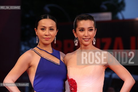 67th Venice International Film Festival - Venice September 5, 2010 - Red Carpet of the film Di Renjie Zhi Tongtian Diguo (Detective Dee and the Mystery of the Phantom Flame) - Actress Li Bingbing (right) with actress Carina Lau