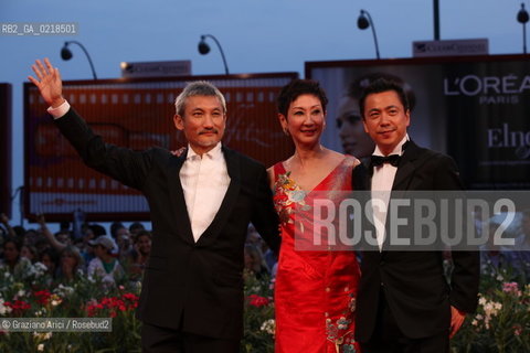 67th Venice International Film Festival - Venice September 5, 2010 - Red Carpet of the film Di Renjie Zhi Tongtian Diguo (Detective Dee and the Mystery of the Phantom Flame) - The director Tsui Hark (left) with the producers