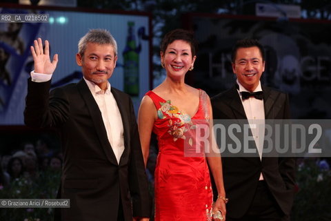 67th Venice International Film Festival - Venice September 5, 2010 - Red Carpet of the film Di Renjie Zhi Tongtian Diguo (Detective Dee and the Mystery of the Phantom Flame) - The director Tsui Hark (left) with the producers
