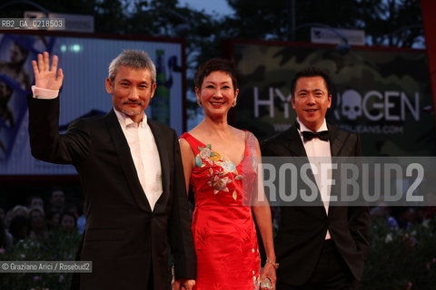 67th Venice International Film Festival - Venice September 5, 2010 - Red Carpet of the film Di Renjie Zhi Tongtian Diguo (Detective Dee and the Mystery of the Phantom Flame) - The director Tsui Hark (left) with the producers