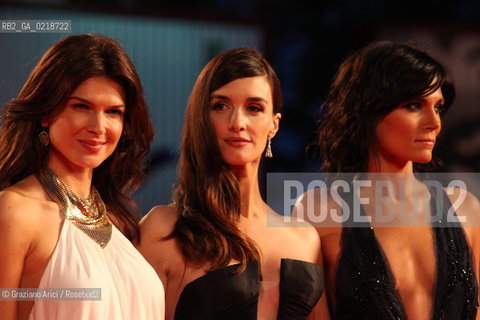 67th Venice International Film Festival - Venice September 5, 2010 - Red Carpet of the film Vallanzasca - Gli Angeli Del Male - Monica Barladeanu, actress (left), with actresses Paz Vega and Valeria Solarino (right).