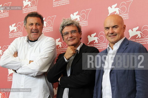 67th Venice International Film Festival - Venice September 7, 2010 - Photocall of the film Noi Credevamo - The director Mario Martone between actors Luca Barbareschi (left) and Luca Zingaretti