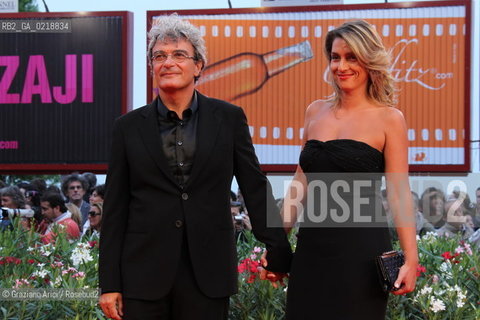 67th Venice International Film Festival - Venice September 7, 2010 - Red Carpet of the film Noi Credevamo - Director Mario Martone with his wife