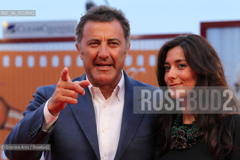 67th Venice International Film Festival - Venice September 7, 2010 - Red Carpet of the film Noi Credevamo - Actor Luca Barbareschi with his partner.