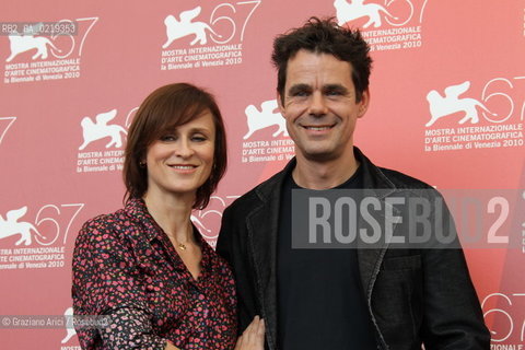 67th Venice International Film Festival - Venice September 10, 2010 - Photocall of the film Drei - The director Tom Tykwer with actress Sophie Rois