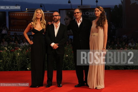 67th Venice International Film Festival - Venice September 10, 2010 - Photocall of the film Barneys Version - Left to right: actress Rosamund Pike, Actor Paul Giamatti, the director Richard J. Lewis with his wife
