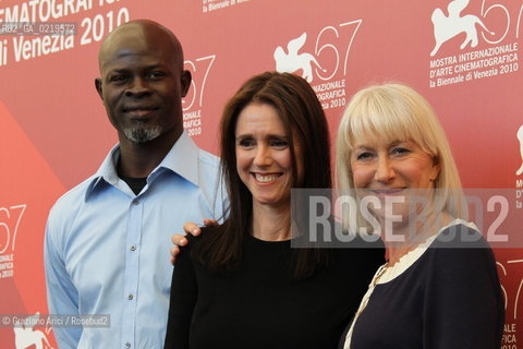 67th Venice International Film Festival - Venice September 11, 2010 - Photocall of the film The Tempest - Left to right: actor Djimon Hounsou, director Julie Taymore, actress Helen Mirren 