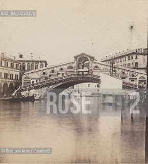 -VENEZIA, SENZA INDICAZIONE DELLAUTORE, PONTE DI RIALTO, SENZA DATA. POSITIVO ALLALBUMINA MONTATO SU CARTONE, FOTOGRAFIA STEREOSCOPICA, CM 17,4X8,4. RIALTO, PONTE, STEREOSCOPICA FOTOANTICHE.-VENICE,NO AUTHORS INDICATION, PONTE DI RIALTO, UNDATED. ALBUMEN POSITIVE MOUNTED ON CARDBOARD, STEREOSCOPICAL PHOTOGRAPH CM 17,4X8,4 © ARCHIVIO Graziano Arici/Rosebud2 