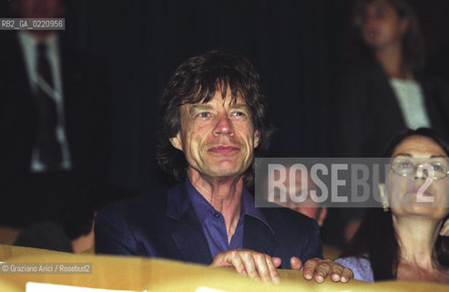 - Venezia, 2000. 57°Festival Internazionale dArte Cinematografica di Venezia.Il cantante rock Mick Jagger, leader dei Rolling Stones,alla prima del film Liam al Palazzo del Cinema. Cinema ritratto musica cantante rock.- Venice, 2000. 57th Venice International Film Festival. Portrait of the singer Mick Jagger, leader of the band Rolling Stones, at projection of the film Liamin the Palazzo del Cinema  ©  Graziano Arici