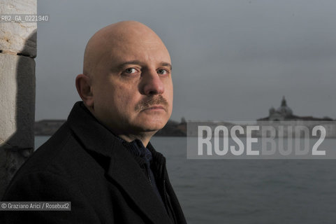 Venice 14/1/11 - The writer Tiziano Scarpa with the Italian national flag. He fought against the racism for an interracial country and now, in the 150 years centennial of italian Unity,  the tricolored flag is his fight flag. ©Graziano Arici/Rosebud2