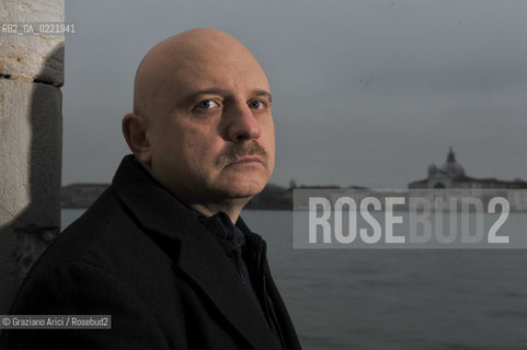 Venice 14/1/11 - The writer Tiziano Scarpa with the Italian national flag. He fought against the racism for an interracial country and now, in the 150 years centennial of italian Unity,  the tricolored flag is his fight flag. ©Graziano Arici/Rosebud2
