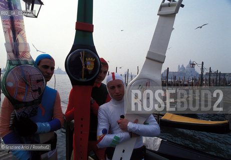 - Venezia,1993.Carnevale di Venezia. Piazza San Marco: Swatch sponsor del carnevale. Carnevale Swatch maschera orologio.- Venice,1993. Carnival of Venice.Saint Marks Square: The Swatch sponsor of the Carnival ©Graziano Arici/Rosebud2