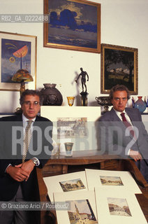 Trieste,1990.Asta degli acquarelli di Hitler. I proprietari della Casa dAste Furio Princivalli e Franco Deboni con gli acquarelli. Asta Hitler acquarelli.Trieste,1990.Auction of the Hitlers paintings water color .The homeowners Furio Princivalli e Franco Deboni with the painting water color ©Graziano Arici/Rosebud2