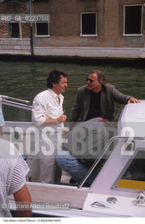 Localizzazione:..VENEZIA..Oggetto:..Soggetto:..CONCERTO DEI PINK FLOYD / NICK MASON E DAVID GILMOUR MUSICA ROCK..Cronologia: ..Definizione Culturale:..   Autore: ..   Stile: ..   Editori/Stampatori:..   Committenza:..Materia e Tecnica:..Collocazione:..Note:....Riproduzione Fotografica:..Graziano Arici/Rosebud2 .Copyright:..Graziano Arici/Rosebud2 .Data:..LUGLIO 1989..Costo:..A