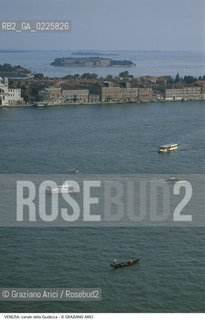 Localizzazione:..VENEZIA / DORSODURO..Oggetto:..Soggetto:..CANALE E ISOLA DELLA GIUDECCA / S. CLEMENTE GONDOLA..Cronologia: ....Definizione Culturale:..   Autore: ....   Stile:....   Editori/Stampatori:..   Committenza:..Materia e Tecnica:....Collocazione:..Note:..MONUMENTALE DALL ALTO..Riproduzione Fotografica:..Graziano Arici/Rosebud2 .Copyright:..Graziano Arici/Rosebud2 .Data:..1990..Costo:..A..