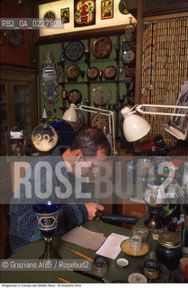 Caption: Nome:..GHETTO NOVO : ARTIGIANATO (DECORAZIONE SU VETRO DI MOTIVI DECORATIVI EBRAICI) ....Localizzazione:..VENEZIA / CANNAREGIO / GHETTO VECCHIO  ..VENICE / CANNAREGIO  / GHETTO VECCHIO   ..Soggetto:..ARTE EBRAICA / ARTIGIANATO / DECORAZIONE SU VETRO  ..JEWISH ART / HANDYCRAFT  / PAINTING ON GLASS  ..Cronologia:......Autore:......Stile:......Editori Stampatori:......Committenza:......Materia e Tecnica:......Collocazione:......Note:......Riproduzione Fotografica:..Graziano Arici/Rosebud2  ....Copyright:..Graziano Arici/Rosebud2/  ....Data:..1994....Costo:..A....Key:..GHETTO NOVO ARTIGIANATO  ..HANDYCRAFT