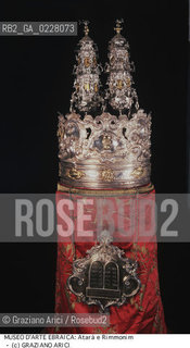 Nome:..MUSEO DI ARTE EBRAICA : ATARÀ (CORONA) / RIMMONIN (PUNTALI) ADDOBBI DI UN ROTOLO DELLA LEGGE)..     ..Localizzazione:..VENEZIA / CANNAREGIO / CAMPO DEL GHETTO NOVO 2902/B / MUSEO DI ARTE EBRAICA  ..VENICE / CANNAREGIO / CAMPO GHETTO NOVO  2902/B / THE MUSEUM OF JEWISH ART     ..Soggetto:..ATARÀ (CORONA) / RIMMONIN (PUNTALI) ADDOBBI DI UN ROTOLO DELLA LEGGE)   ..ATARAH (CROWN) / RIMMONIM (BELL CAPS) / (DECORATION FOR THE SCROLL OF THE TORAH)   ..Cronologia:..SEC.XIX  ..XIXth CENTURY    ..Autore:......Stile:......Editori Stampatori:......Committenza:......Materia e Tecnica:..ARGENTO E ARGENTO DORATO / ARGENTO  ..SILVER ANDSILVER GILT / SILVER   ..Collocazione:......Note:......Riproduzione Fotografica:  ..Graziano Arici/Rosebud2 ....Copyright:..Graziano Arici/Rosebud2/....Data:..1994 ....Costo:..A....Key:..MUSEI  OGGETTI   ..MUSEUMS  OBJECTS..