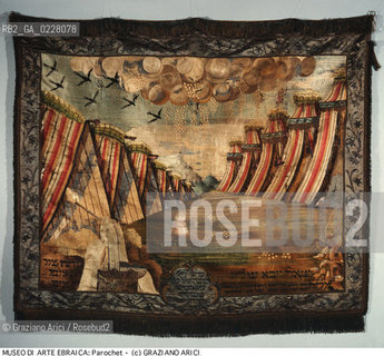 Nome:..MUSEO DI ARTE EBRAICA : PAROCHET (TENDAGGIO PER LARON ARCA SANTA) : RAFFIGURA LA DIMORA DEGLI EBREI NEL DESERTO CON LACCAMPAMENTO, LA MANNA, LE QUAGLIE, LA MANO DI MOSE CHE FA SCATURIRE LACQUA DALLA ROCCIA..    ..Localizzazione:..VENEZIA / CANNAREGIO / CAMPO DEL GHETTO NOVO 2902/B / MUSEO DI ARTE EBRAICA  ..VENICE / CANNAREGIO / CAMPO GHETTO NOVO  2902/B / THE MUSEUM OF JEWISH ART     ..Soggetto:..PAROCHET (TENDAGGIO PER LARON ARCA SANTA) : RAFFIGURA LA DIMORA DEGLI EBREI NEL DESERTO CON LACCAMPAMENTO, LA MANNA, LE QUAGLIE, LA MANO DI MOSE CHE FA SCATURIRE LACQUA DALLA ROCCIA  ..PAROKHET (CURTAIN FOR THE ARK OF THE COVENANT) :  IT SHOWS THE JEWS CAMPING IN THE DESERT WITH ROWS OF TENTS, MANNA, QUAILS AND THE HAND OF MOSES DRAWING WATER FROM THE ROCK  ..Cronologia:..SEC. XIX INIZIO / 1804  ..XIXth CENTURY / 1804    ..Autore:......Stile:......Editori Stampatori:......Committenza:......Materia e Tecnica:..RASO DI SETA RICAMATO CON SETE POLICROME  ..SATIN EMBROIDERED WITH COLOURED SILKS  ..Collocazione:......Note:..RELIGIONE EBRAICA / DONATO DALLA COMUNITÀ LEVANTINA   ..JEWISH RELIGION  / DONATED BY THE LEVANTINE COMMUNITY   ..Riproduzione Fotografica:  ..Graziano Arici/Rosebud2 ....Copyright:..Graziano Arici/Rosebud2/....Data:..1994 ....Costo:..A....Key: ..MUSEI  OGGETTI   ..MUSEUMS  OBJECTS ..