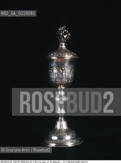 Nome:..MUSEO DI ARTE EBRAICA : CALICE PER IL KIDDUSH (PER LA BENEDIZIONE DEL VINO)..      ..Localizzazione:..VENEZIA / CANNAREGIO / CAMPO DEL GHETTO NOVO 2902/B / MUSEO DI ARTE EBRAICA  ..VENICE / CANNAREGIO / CAMPO GHETTO NOVO  2902/B / THE MUSEUM OF JEWISH ART     ..Soggetto:..CALICE PER IL KIDDUSH (PER LA BENEDIZIONE DEL VINO)   ..KIDDUSH CHALICE (FOR BLESSING THE WINE)  ..Cronologia:..SEC.XVIII FINE   ..XVIIIth CENTURY    ..Autore:......Stile:......Editori Stampatori:......Committenza:......Materia e Tecnica:..ARGENTO  ..SILVER  ..Collocazione:......Note:......Riproduzione Fotografica:  ..Graziano Arici/Rosebud2 ....Copyright:..Graziano Arici/Rosebud2/....Data:..1994 ....Costo:..A....Key:..MUSEI  OGGETTI   ..MUSEUMS  OBJECTS  ..