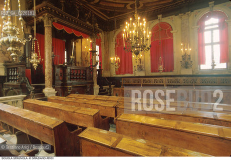Caption: Nome:..SCUOLA GRANDE SPAGNOLA : INTERNO VERSO LA BIMA..     ..Localizzazione:..VENEZIA / CANNAREGIO / GHETTO VECCHIO / SINAGOGA / SCUOLA GRANDE SPAGNOLA   ..VENICE / CANNAREGIO /  GHETTO VECCHIO / SYNAGOGUE / SCUOLA GRANDE SPAGNOLA     ..Soggetto:..INTERNO VERSO LA BIMA / ARREDI LIGNEI  ..INTERIOR TOWARDS BIMAH / WOODEN FURNITURE   ..Cronologia:..SEC. XVI SECONDA METÀ / RIEDIFICATA NEL SEC. XVII PRIMA METÀ   ..XVIth CENTURY / REBUILT IN THE XVIIth CENTURY   ..Autore:..LONGHENA BALDASSARRE / MANIERA    ..LONGHENA BALDASSARRE / STYLE   ..Stile:..BAROCCO  ..BAROQUE   ..Editori Stampatori:......Committenza:......Materia e Tecnica:......Collocazione:......Note:......Riproduzione Fotografica:  ..Graziano Arici/Rosebud2 ....Copyright:..Graziano Arici/Rosebud2/....Data:..1994 ....Costo:..A....Key:..CHIESA..CHURCH