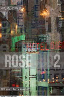 Caption: Localizzazione:..VENEZIA / CASTELLO..Oggetto:..Soggetto:..INSEGNE TURISTICHE IN CALLE DELLE RAZZE / NEON..Cronologia: ..Definizione Culturale:..   Autore: ..   Stile: ..   Editori/Stampatori:..   Committenza:..Materia e Tecnica:..Collocazione:..Note:..TURISMO DEGRADO URBANO..Riproduzione Fotografica:..Copyright:..Graziano Arici/Rosebud2 .Data:..1994..Costo:..A