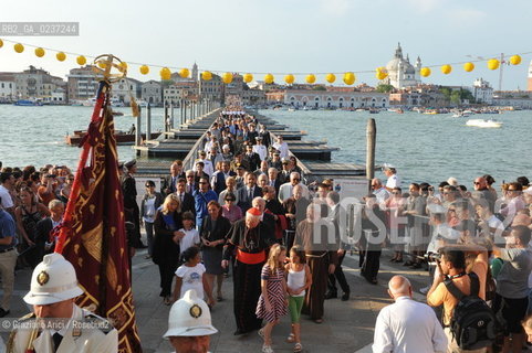 Venice 16/7/11 - The cardinal Angelo Scola over the Boat-Bridge in Giudecca Canal for the Redentore Feast festa fuochi dartificio ©Graziano Arici/Rosebud2