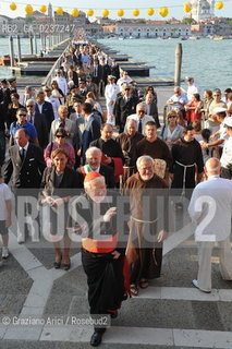 Venice 16/7/11 - The cardinal Angelo Scola over the Boat-Bridge in Giudecca Canal for the Redentore Feast festa fuochi dartificio ©Graziano Arici/Rosebud2