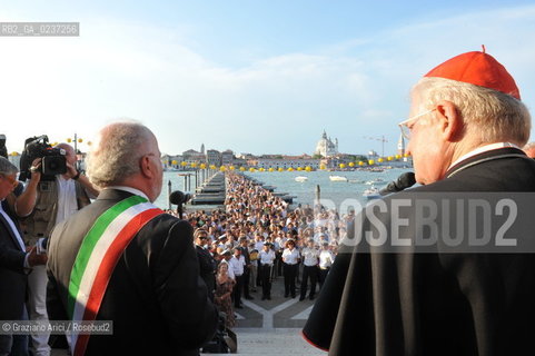 Venice 16/7/11 - The cardinal Angelo Scola over the Boat-Bridge in Giudecca Canal for the Redentore Feast festa fuochi dartificio ©Graziano Arici/Rosebud2