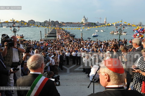 Venice 16/7/11 - The cardinal Angelo Scola over the Boat-Bridge in Giudecca Canal for the Redentore Feast festa fuochi dartificio ©Graziano Arici/Rosebud2