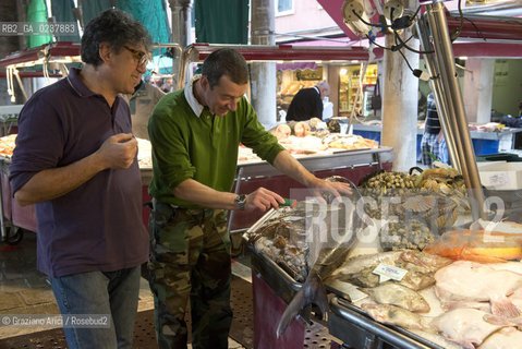Venice 5/5/12 - One of the best fishmonger in the Rialto Fishmarket. Marco Bergamasco - pescivendolo di Rialto pesce mercato ©Graziano Arici/Rosebud2