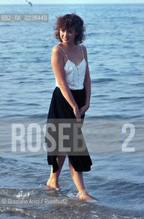 - Venezia, 1980.Festival Internazionale dArte Cinematografica di Venezia.Ritratto dellattrice francese .Sabine Azéma in spiaggia. Cinema ritratto attrice spiaggia mare Lido.- Venice,1980.Venice International Film Festival.Portrait of the actress Sabine Azéma on the beach ©  Graziano Arici MES
