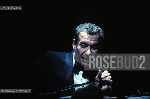 - Venezia,1996. Ritratto del cantautore Paolo Conte durante un concerto. Musica cantautore jazz Folk Pop Blues avvocato Conte pianoforte.- Venice,1996.Portrait of the singer Paolo Conte during a concert  ©  Graziano Arici