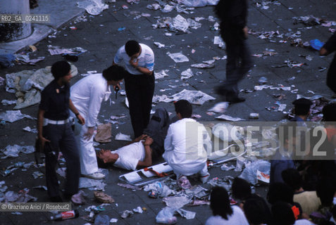 Venezia,1989.Piazza San Marco. Situazione della Piazza dopo il concerto del gruppo rock Pink Floyd. Musica band rock psichedelico progressivo .Venice,1989. St Marks Square after the concert of the Pink Floyd rock band ©Graziano Arici/Rosebud2