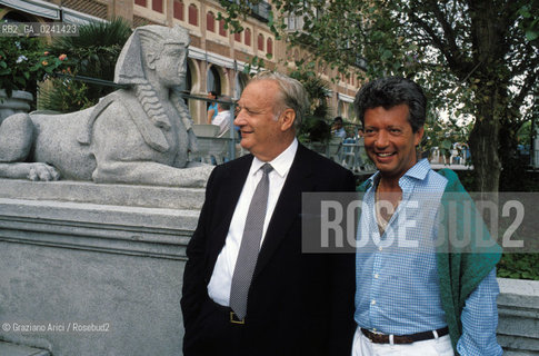 - Venezia, 1980?.Festival Internazionale dArte Cinematografica di Venezia.Ritratto del produttore cinematografico Mario Cecchi Gori insieme al figlio Vittorio allHotel Excelsior. Cinema ritratto produttore politica imprenditore.- Venice,1980?. Venice International Film Festival. Portrait of the producer Mario Cecchi Gori with his son Vittorio in the Excelsior hotel ©  Graziano Arici
