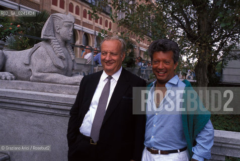 - Venezia, 1980?.Festival Internazionale dArte Cinematografica di Venezia.Ritratto del produttore cinematografico Mario Cecchi Gori insieme al figlio Vittorio allHotel Excelsior. Cinema ritratto produttore politica imprenditore.- Venice,1980?. Venice International Film Festival. Portrait of the producer Mario Cecchi Gori with his son Vittorio in the Excelsior hotel ©  Graziano Arici